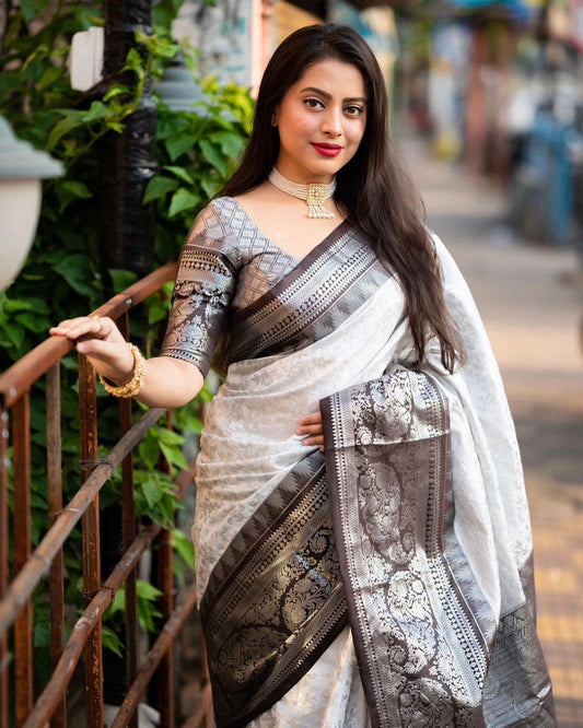 Eye-catching Off White Soft Silk Saree With Beautiful Blouse Piece