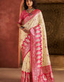 Cynosure Beige Pure Zari Weaving Banarasi Silk Saree With Luxuriant Blouse Piece