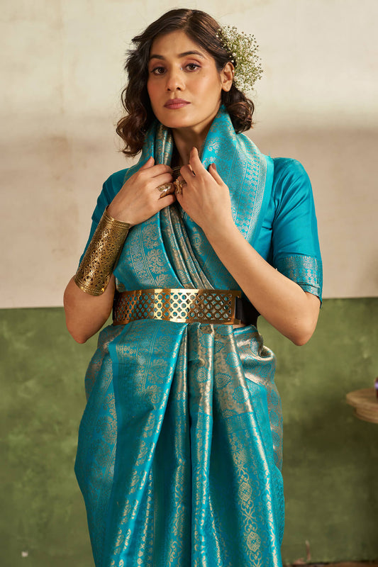 Ethereal Firozi Kanjivaram Silk Saree With Elegant Blouse Piece