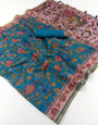 Flameboyant Firozi Printed Cotton Silk Saree With Snazzy Blouse Piece