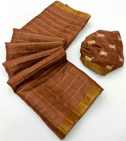 Cynosure Brown Printed Tussar Silk Saree With Unequalled Blouse Piece