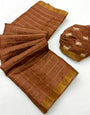 Cynosure Brown Printed Tussar Silk Saree With Unequalled Blouse Piece