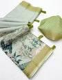 Staring Pista Printed Cotton Silk Saree With Mesmeric Blouse Piece
