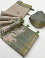 Cynosure Beige Printed Cotton Silk Saree With Surpassing Blouse Piece