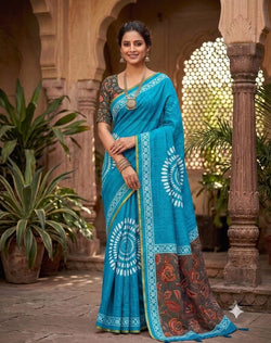 Fugacious Firozi Printed Cotton Silk Saree With Stunner Blouse Piece