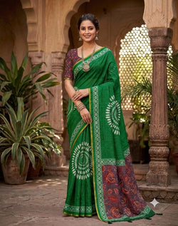 Smashing Dark Green Printed Cotton Silk Saree With Flamboyant Blouse Piece