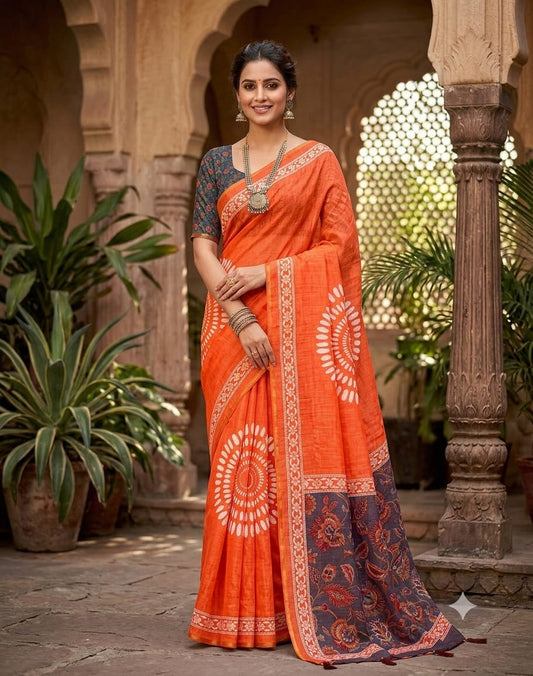 Quintessential Orange Printed Cotton Silk Saree With Adorning Blouse Piece
