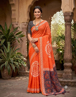 Quintessential Orange Printed Cotton Silk Saree With Adorning Blouse Piece