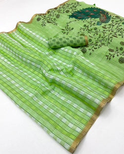 Redolent Green Printed Cotton Silk Saree With Glamorous Blouse Piece
