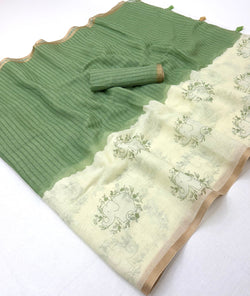 Opulent Beige And Green Printed Cotton Silk Saree With Pulsating Blouse Piece