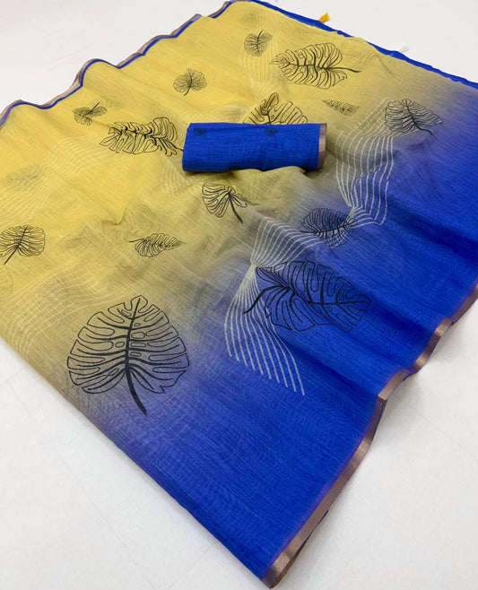 Staggering Yellow and Blue Printed Cotton Silk Saree With Beautiful Blouse Piece