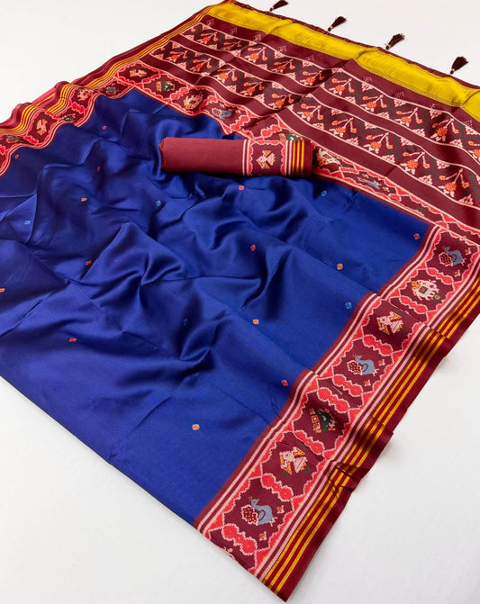 Engaging Royal Blue Printed Patola Handloom Silk Saree With Ratatouille Blouse Piece
