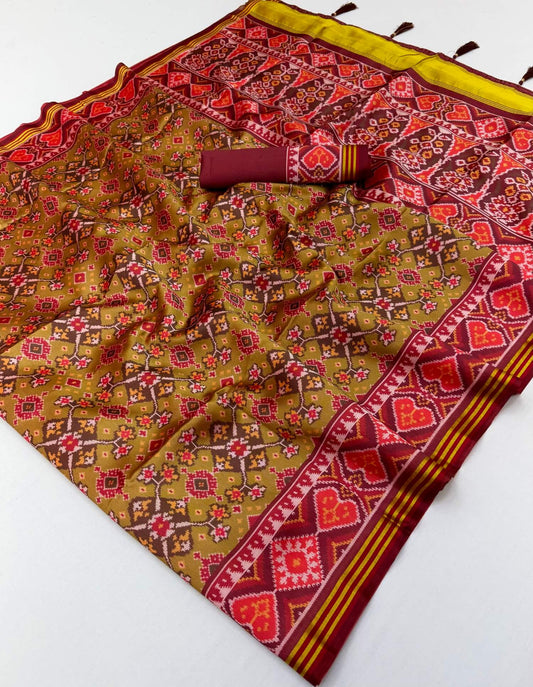 Charming Mustard Printed Patola Handloom Silk Saree With Dulcet Blouse Piece