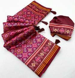 Ebullience Purple Printed Patola Handloom Silk Saree With Scintilla Blouse Piece