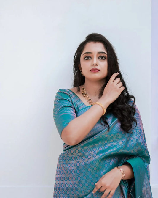 Effervescent Firozi Soft Silk Saree With Efflorescence Blouse Piece