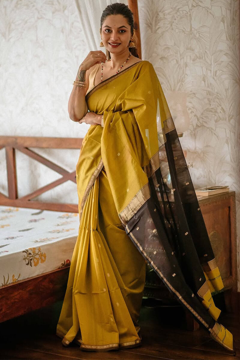 Stunning Mustard Cotton Silk Saree With Intricate Blouse Piece