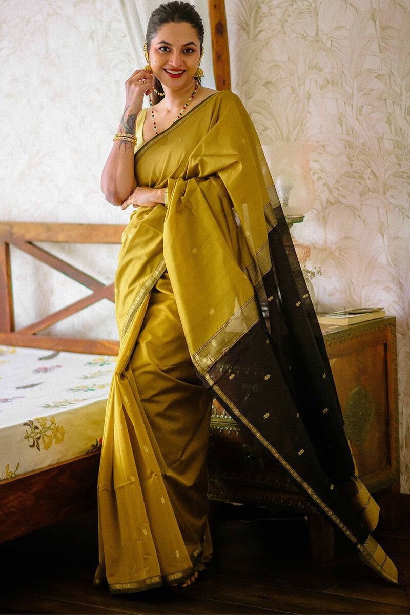 Stunning Mustard Cotton Silk Saree With Intricate Blouse Piece