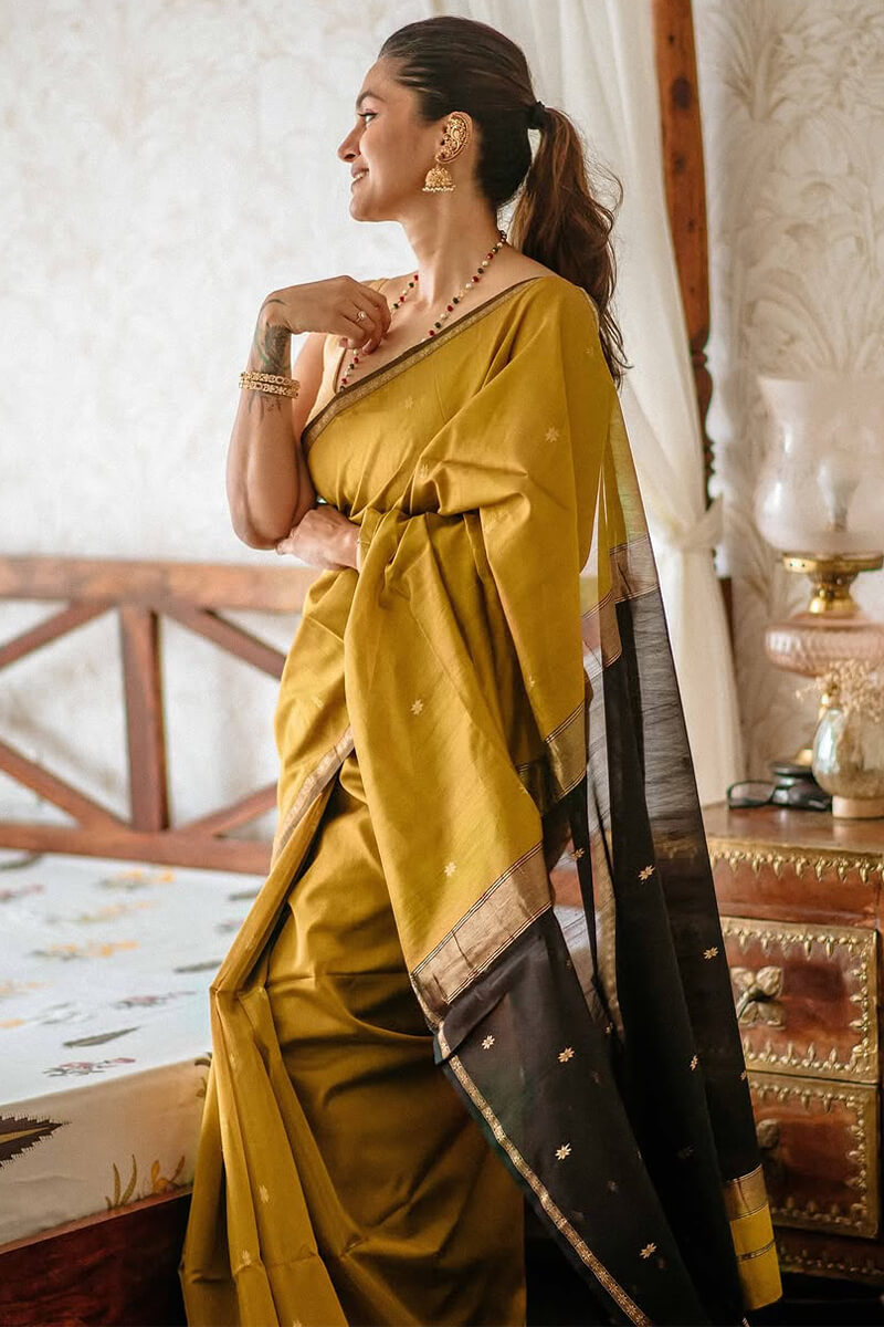 Stunning Mustard Cotton Silk Saree With Intricate Blouse Piece