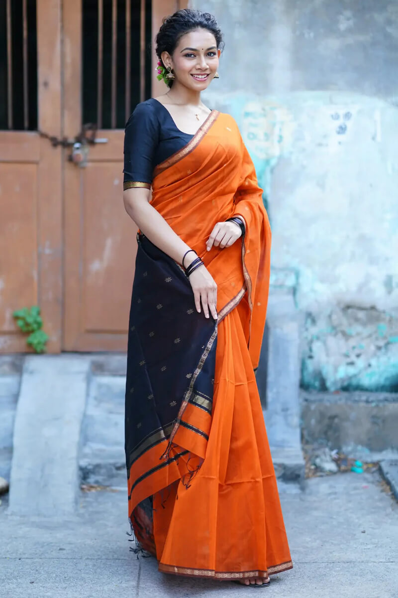 Gleaming Orange Cotton Silk Saree With Sizzling Blouse Piece