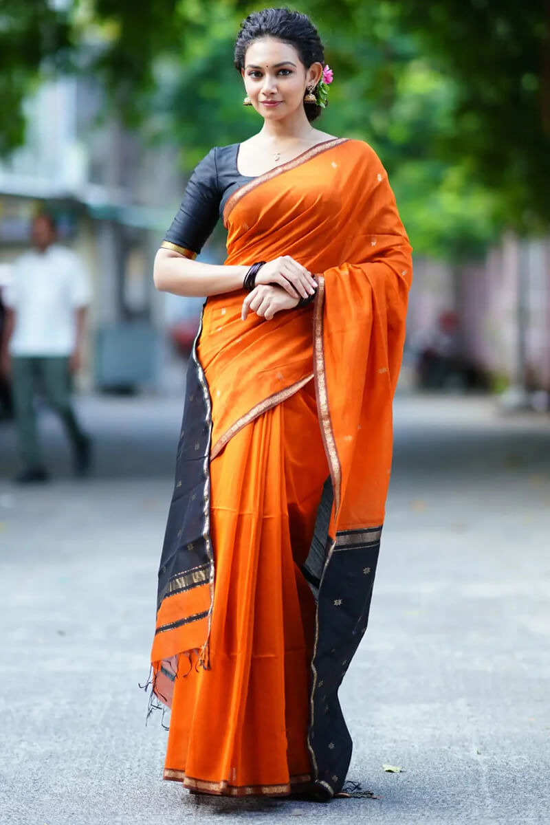 Gleaming Orange Cotton Silk Saree With Sizzling Blouse Piece