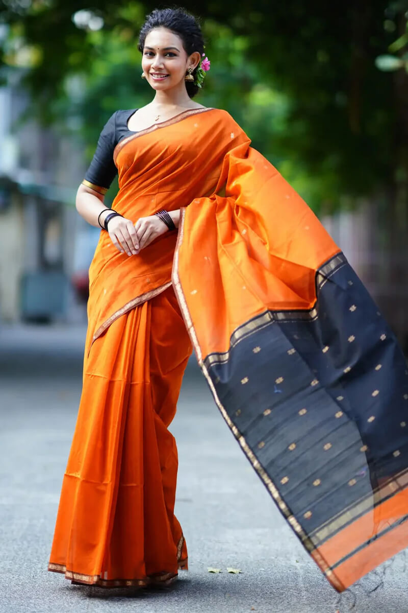 Gleaming Orange Cotton Silk Saree With Sizzling Blouse Piece