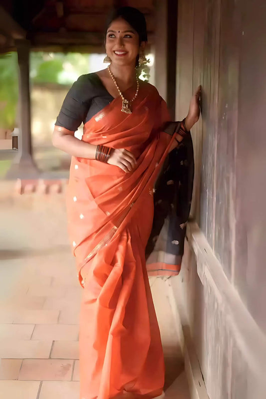 Evocative Orange Cotton Silk Saree With Eclat Blouse Piece