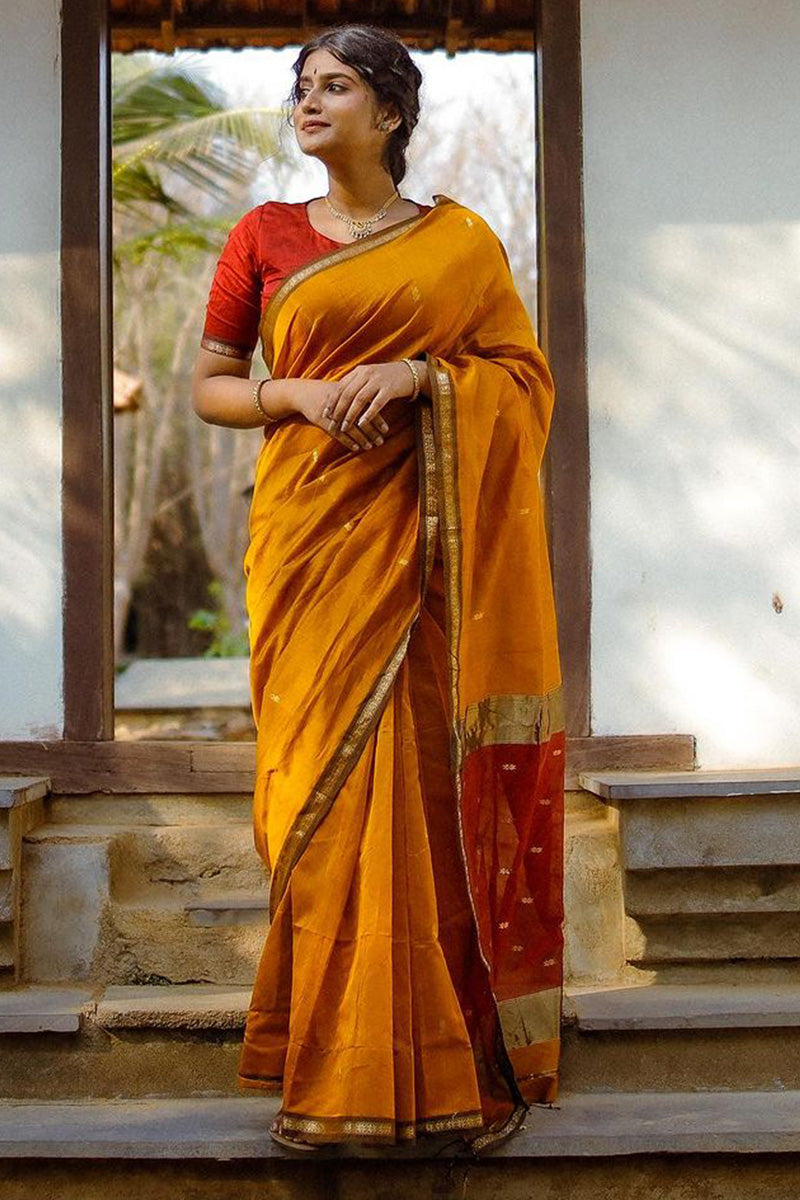 Trendy Yellow Cotton Silk Saree With Enchanting Blouse Piece