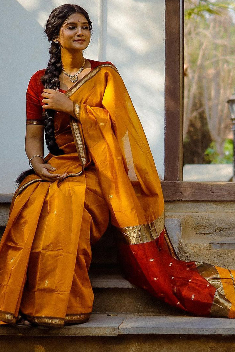 Trendy Yellow Cotton Silk Saree With Enchanting Blouse Piece