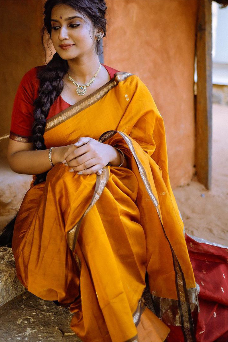 Trendy Yellow Cotton Silk Saree With Enchanting Blouse Piece