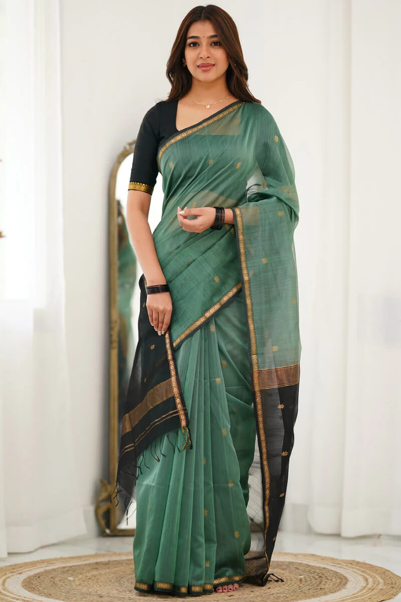 Prominent Sea Green Cotton Silk Saree With Desirable Blouse Piece