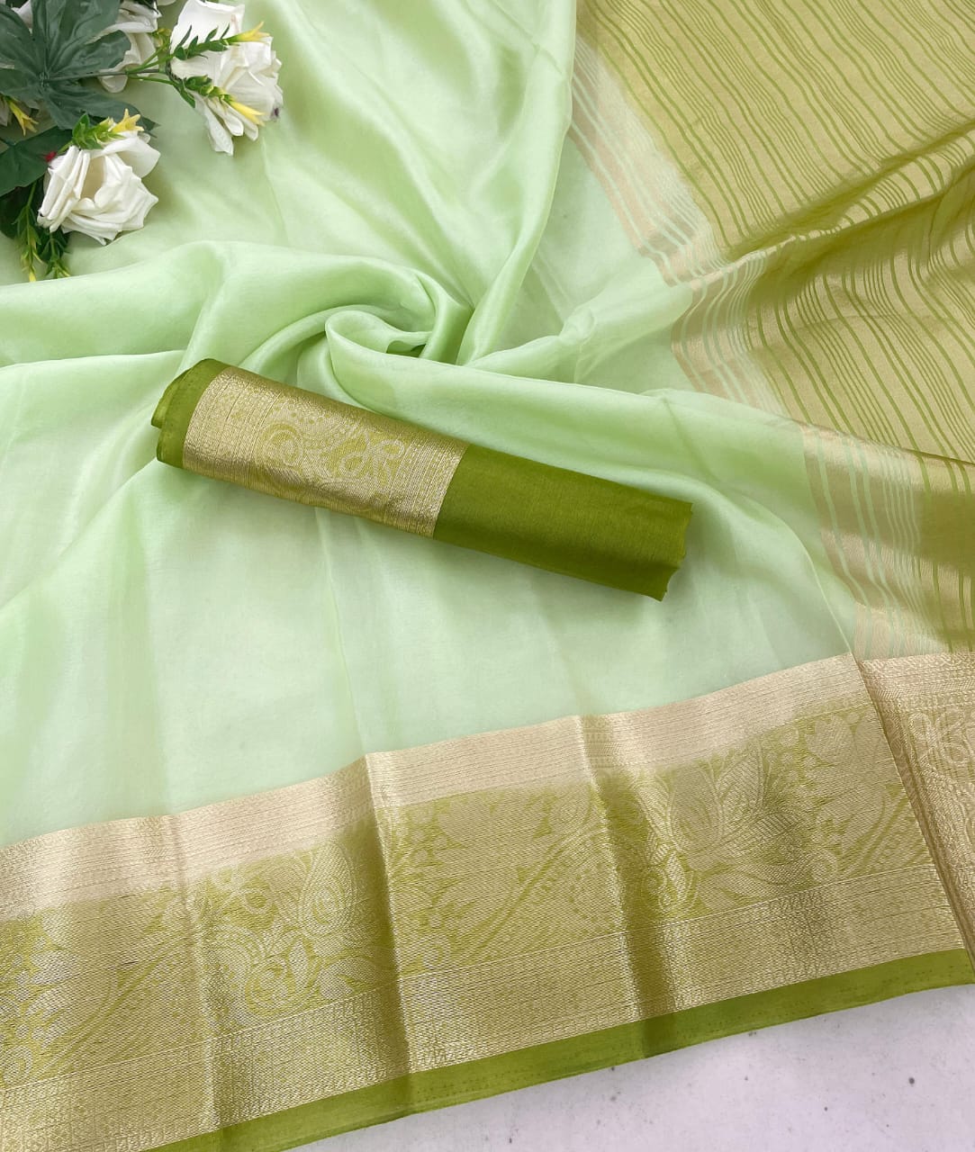 Mellifluous Pista Orgenza Silk Saree With Conflate Blouse Piece