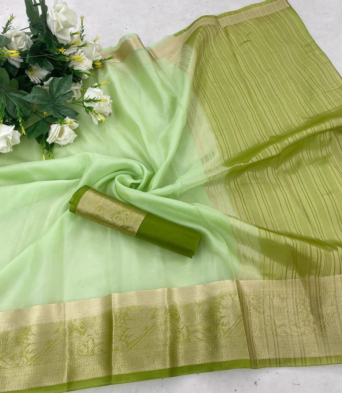 Mellifluous Pista Orgenza Silk Saree With Conflate Blouse Piece