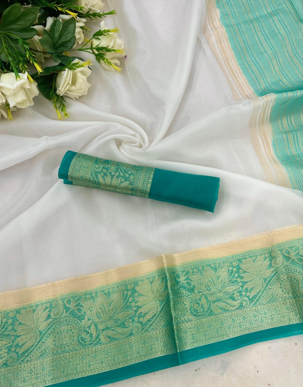 Grandiose White and Firozi Orgenza Silk Saree With Fantabulous Blouse Piece