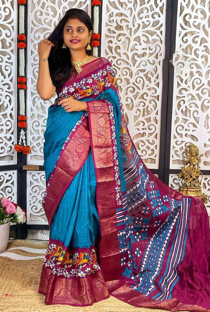 Tempting Firozi Digital Printed Dola Silk Saree With Fragrant Blouse Piece