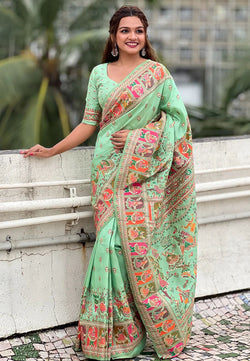 Glowing Pista Nylon Dola Pashmina Saree With Mellifluous Blouse Piece