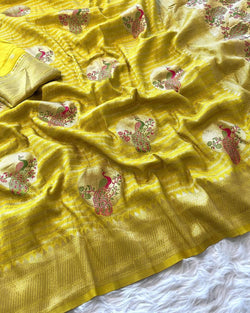 Symmetrical Yellow Soft Banarasi Silk Saree With Sizzling Blouse Piece