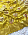 Symmetrical Yellow Soft Banarasi Silk Saree With Sizzling Blouse Piece
