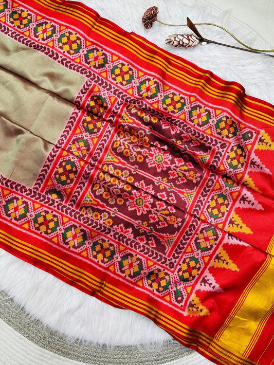 Surreptitious Dark Beige Ikkat Printed Patola Silk Saree With Mesmeric Blouse Piece