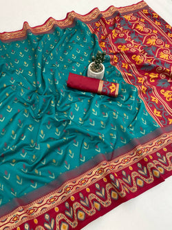Appealing Rama Banarasi Ikkat Silk Saree With Desirable Blouse Piece