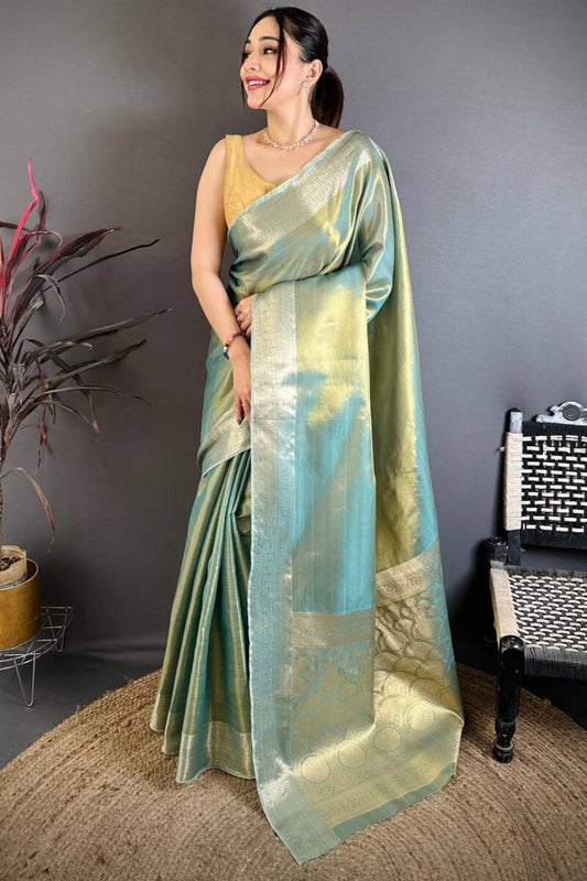 Whimsical Sky Banarasi Tissue Silk Saree With Opulent Blouse Piece