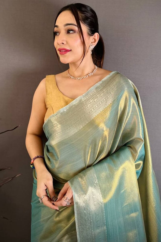 Whimsical Sky Banarasi Tissue Silk Saree With Opulent Blouse Piece