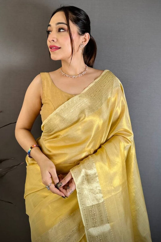 Unequalled Yellow Banarasi Tissue Silk Saree With Embrocation Blouse Piece