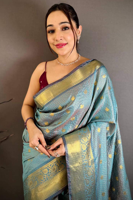 Stunning Sky Banarasi Tissue Silk Saree With Glowing Blouse Piece