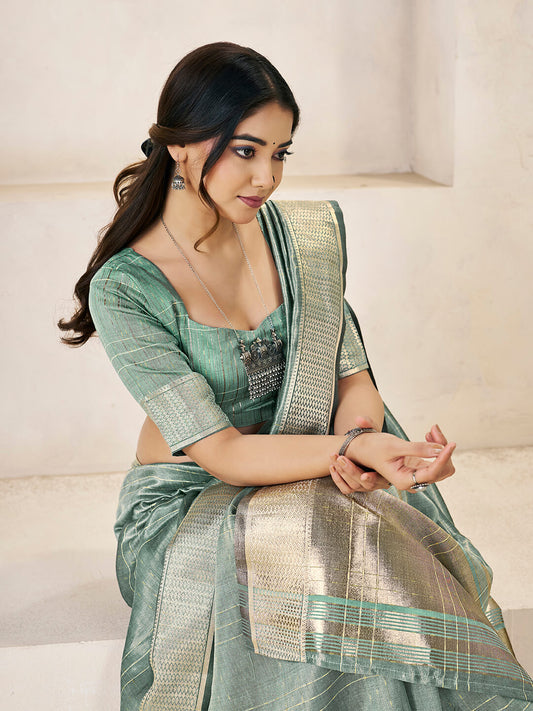Twirling Green Zari Weaving Linen Silk Saree With Desiring Blouse Piece