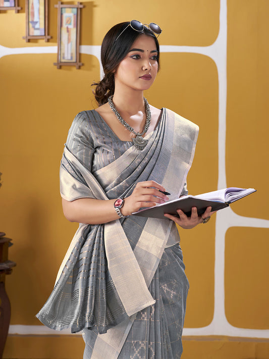 Enticing Silver Zari Weaving Linen Silk Saree With Serendipity Blouse Piece