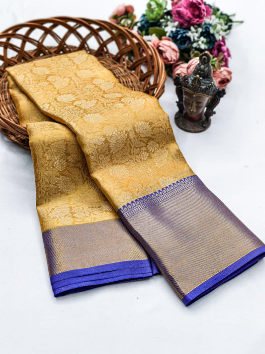 Surpassing Golden Soft Tissue Silk Saree With Exemplary Blouse Piece