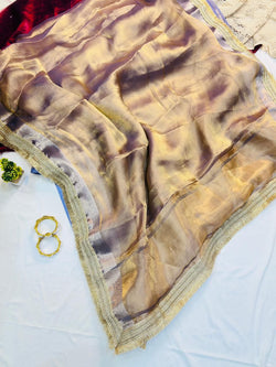 Scrumptious Lavender Tissue Silk Saree With Moiety Blouse Piece