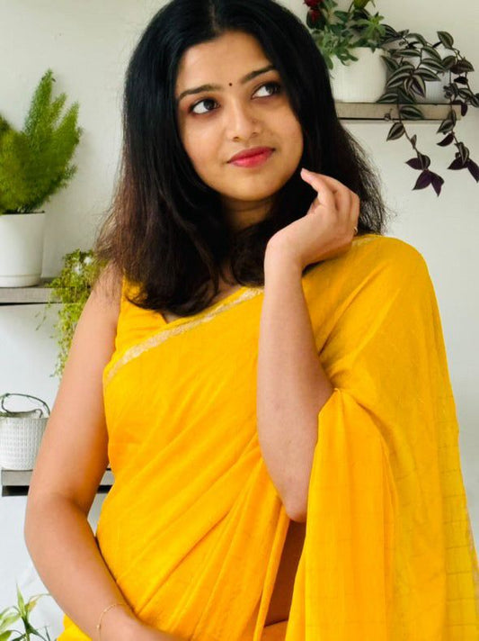 Prodigal Yellow Banarasi Georgette Silk Saree With Enchanting Blouse Piece