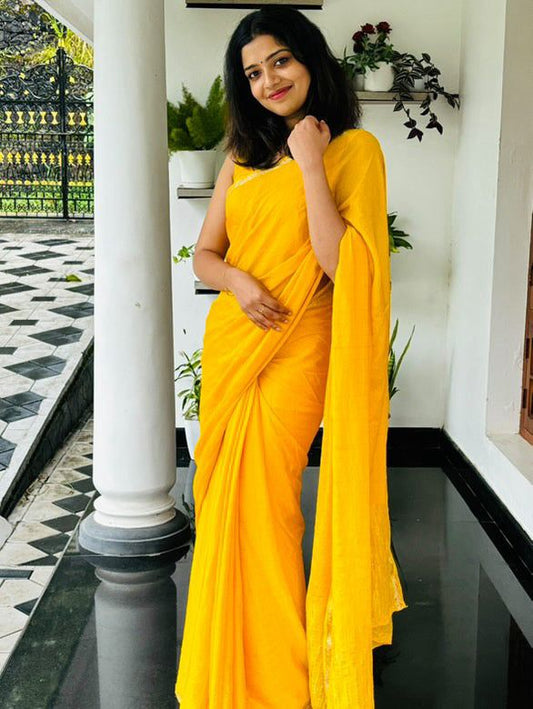 Prodigal Yellow Banarasi Georgette Silk Saree With Enchanting Blouse Piece