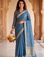 Enchanting Blue Zari Weaving Linen Silk Saree With Fairytale Blouse Piece